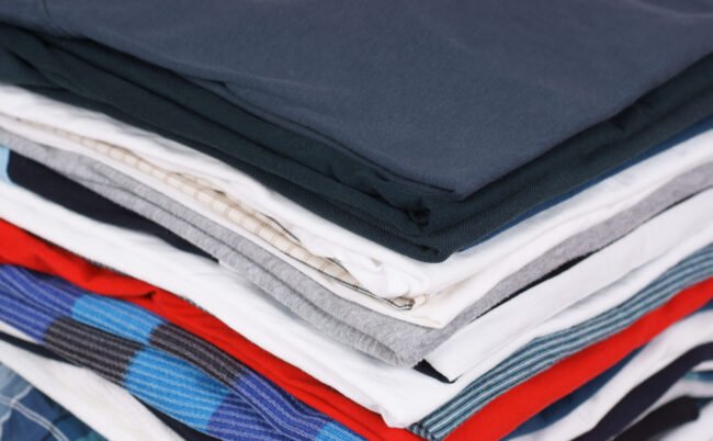 Pile of colorful clothes, stack of clothing